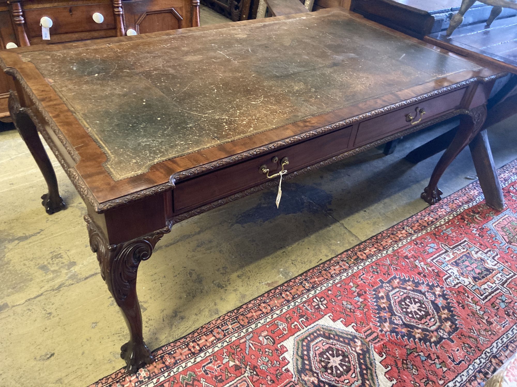 A George III style mahogany leather topped writing table, width 182cm, depth 104cm, height 76cm